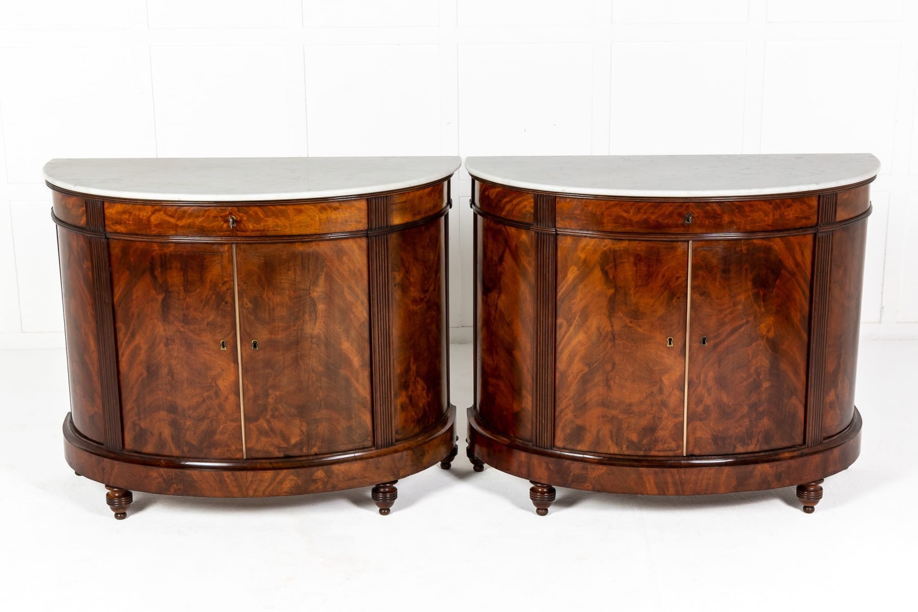 Pair of Early 19th Century Mahogany Demi Lune Cabinets