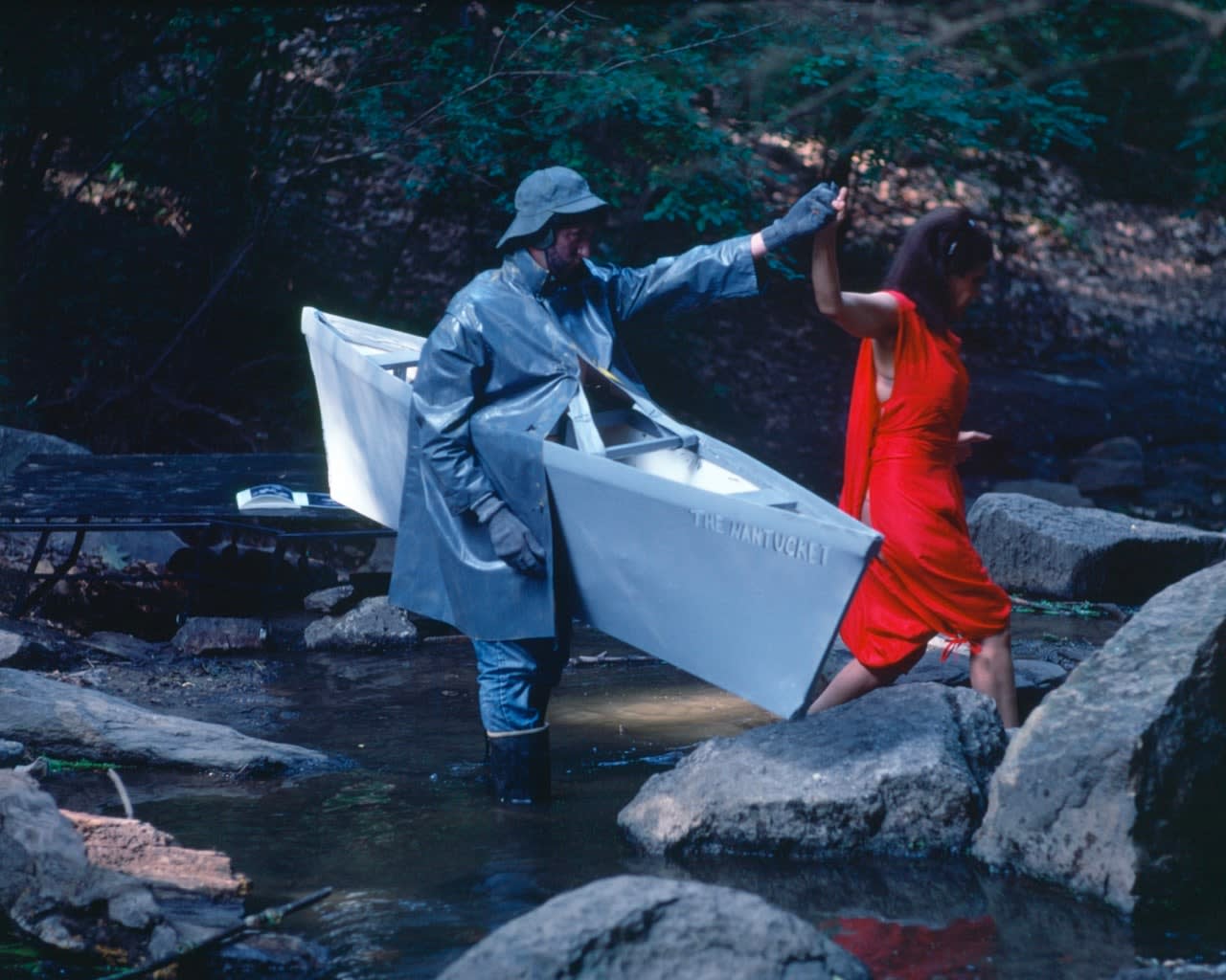 Lorraine O'Grady, Rivers, First Draft: The Nantucket Memorial guides the Woman in Red to the other side of the stream,...