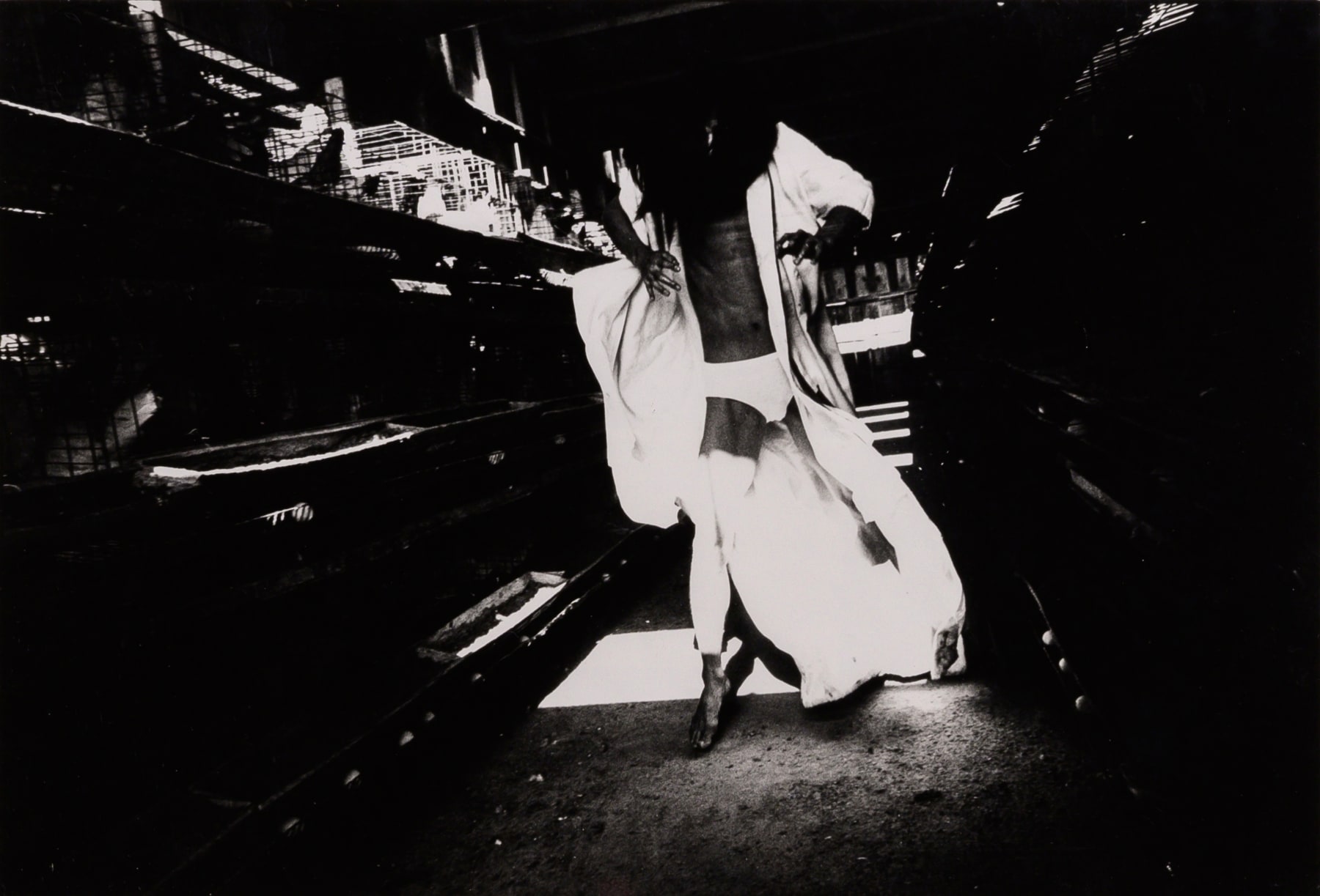 Tatsumi Hijikata - Archive, 高梨豊: 鶏小屋の土方巽, Photograph by Yutaka Takanashi, Tatsumi Hijikata inside a Chicken Coop, 1969