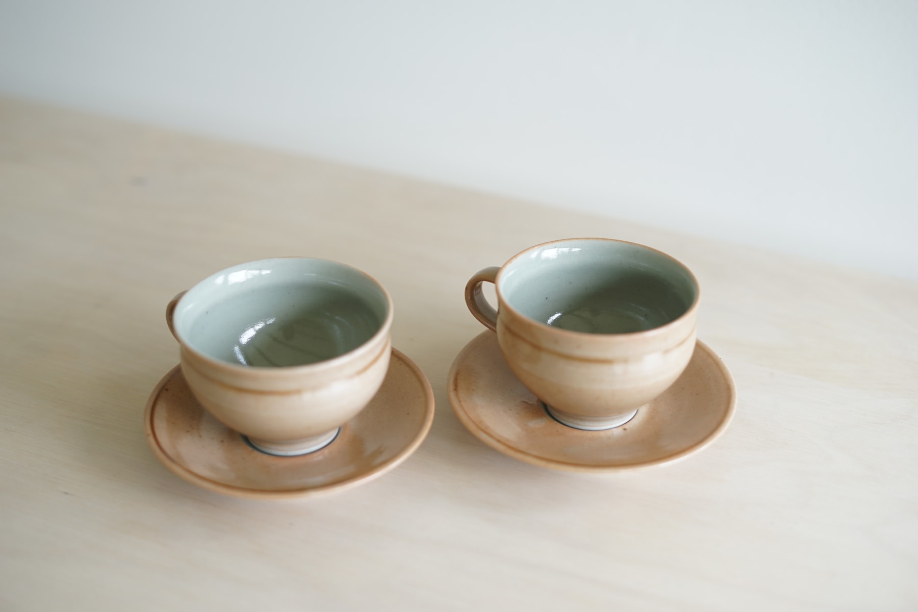 Gwyn Hanssen Pigott, Pair of Coffee Cups and Saucers