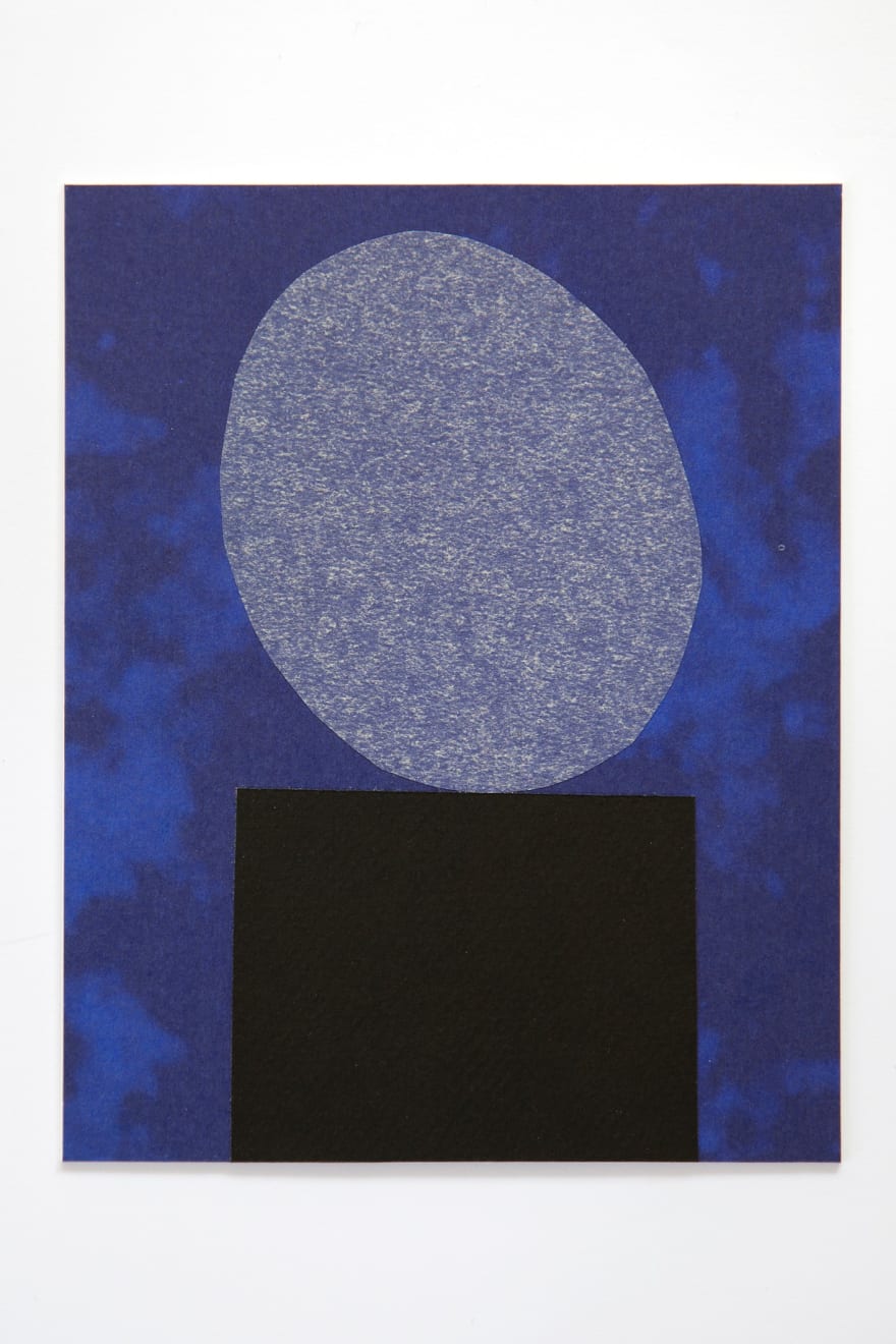Sári Ember, Untitled (blue head on black stone), 2018