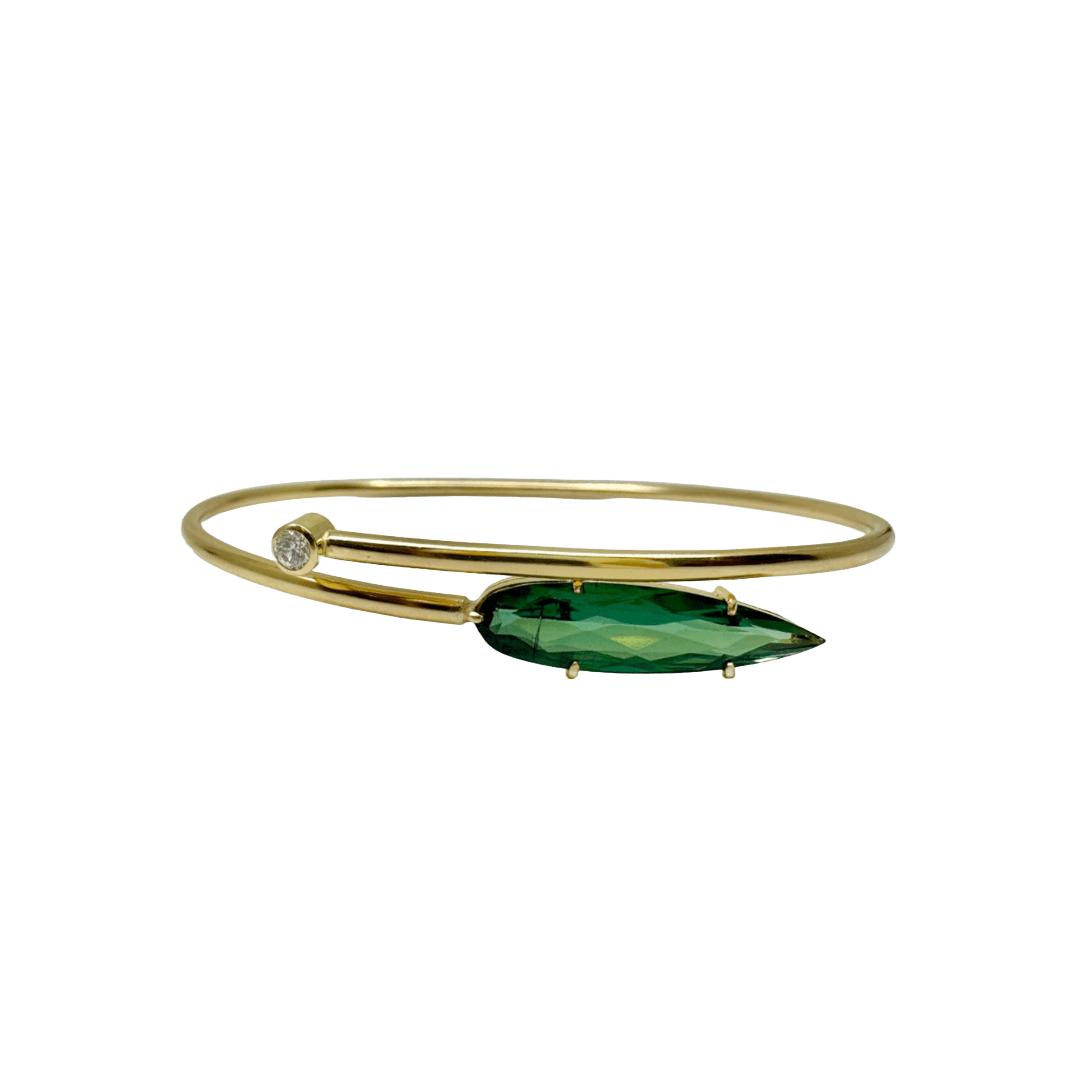 18k yellow gold bracelet with green tourmaline and a bezel set diamond by Fringe Gallery studio jeweler Sandra Frias