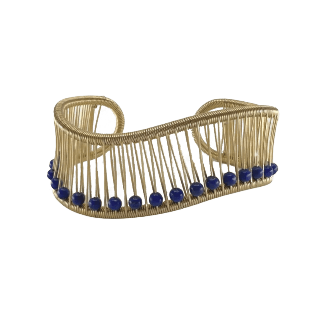 Gold wave cuff with lapis cuff by slate gray gallery jeweler tana acton