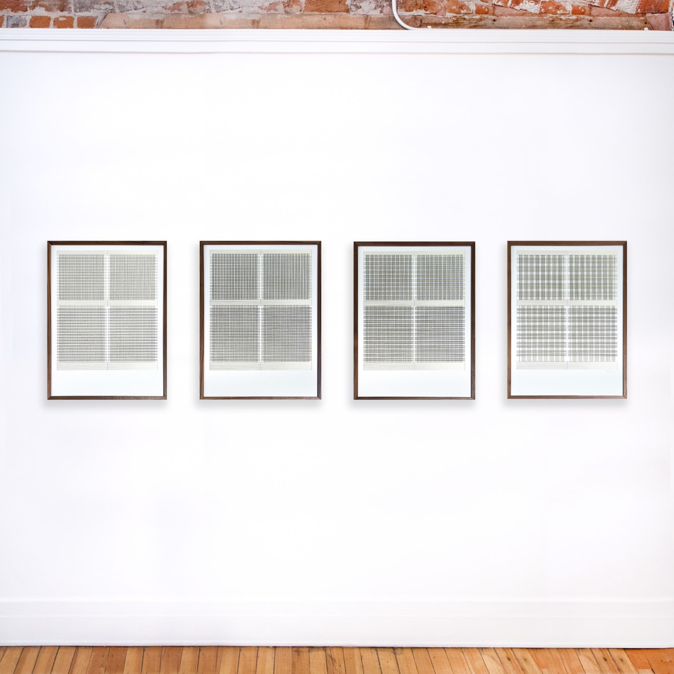 Series of framed green thread on paper works by Fringe Gallery artist Rebecca Messier
