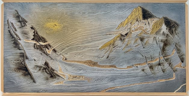 A 2d carving of mountains by slate gray gallery artist Cie Hoover