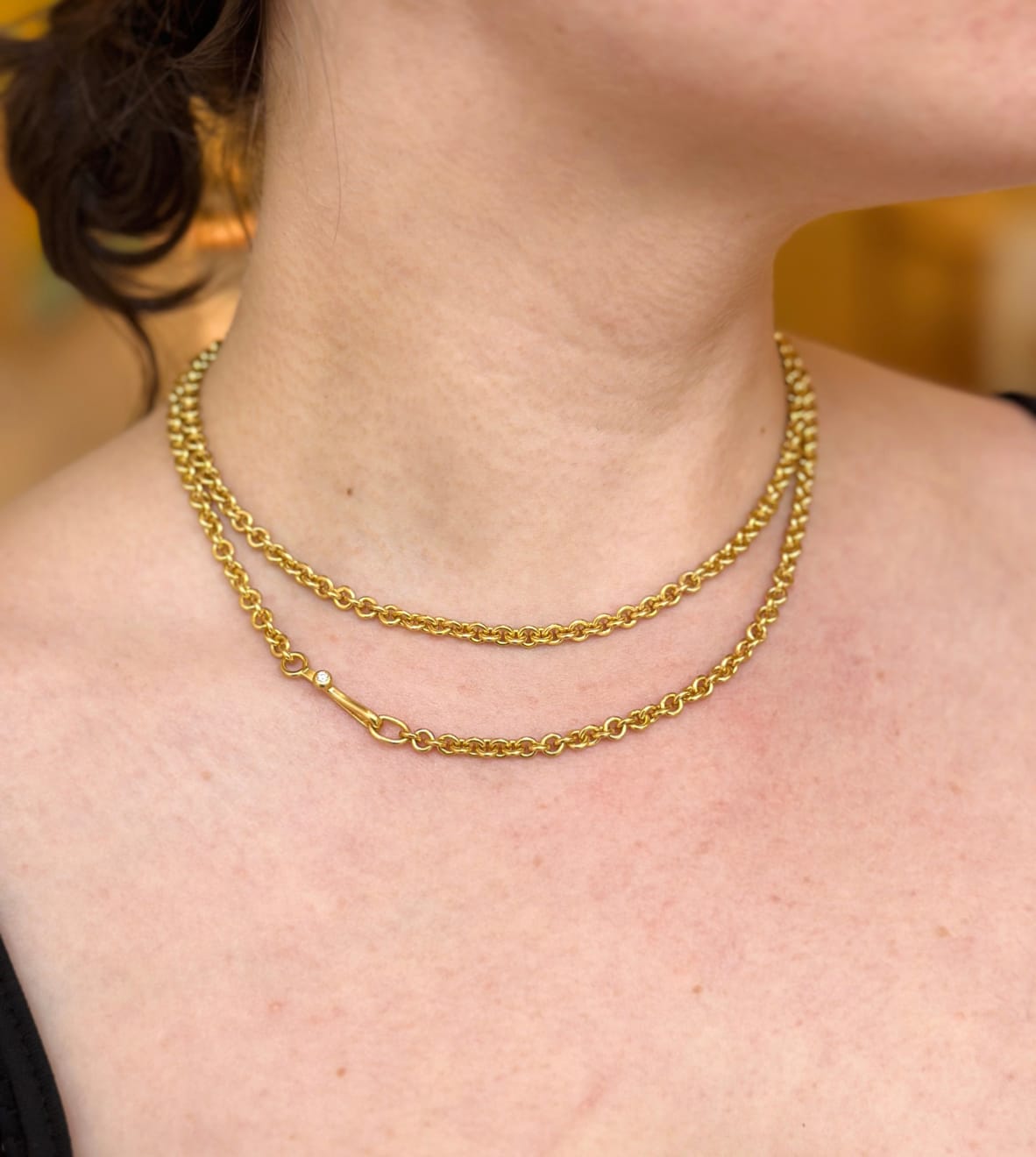 22k yellow gold round link chain with diamond on the hook by Fringe Gallery studio jeweler Nanci Modica