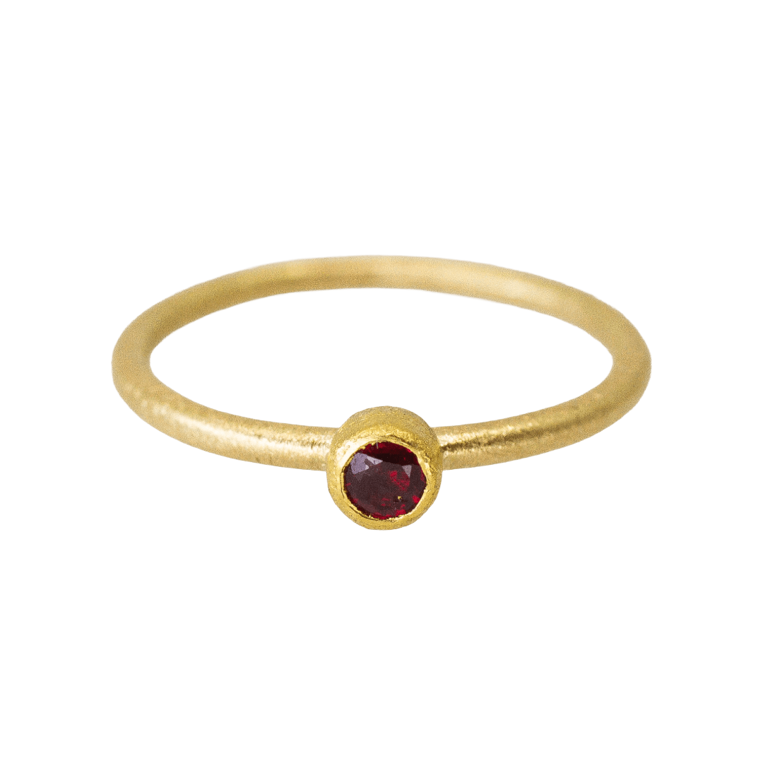 22k and 18k yellow gold ring with bezel set faceted ruby by Fringe Gallery studio jeweler Petra Class