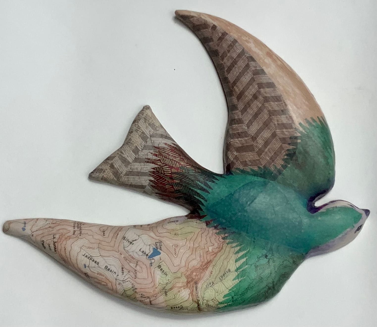 Clay with mixed media sculpture of a bird by Slate Gray Gallery artist Julie McNair