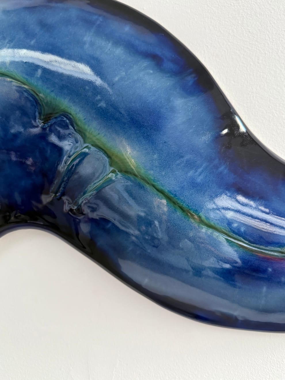 Glazed ceramic blue sculpture by Fringe Gallery artist Angela Okajima-Kempinas