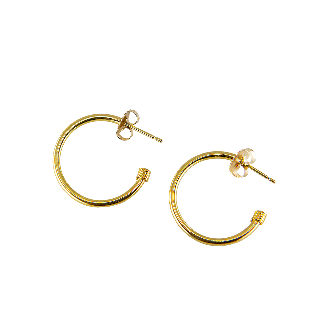 Yellow gold skinny hoops by Fringe Gallery studio jeweler Nanci Modica