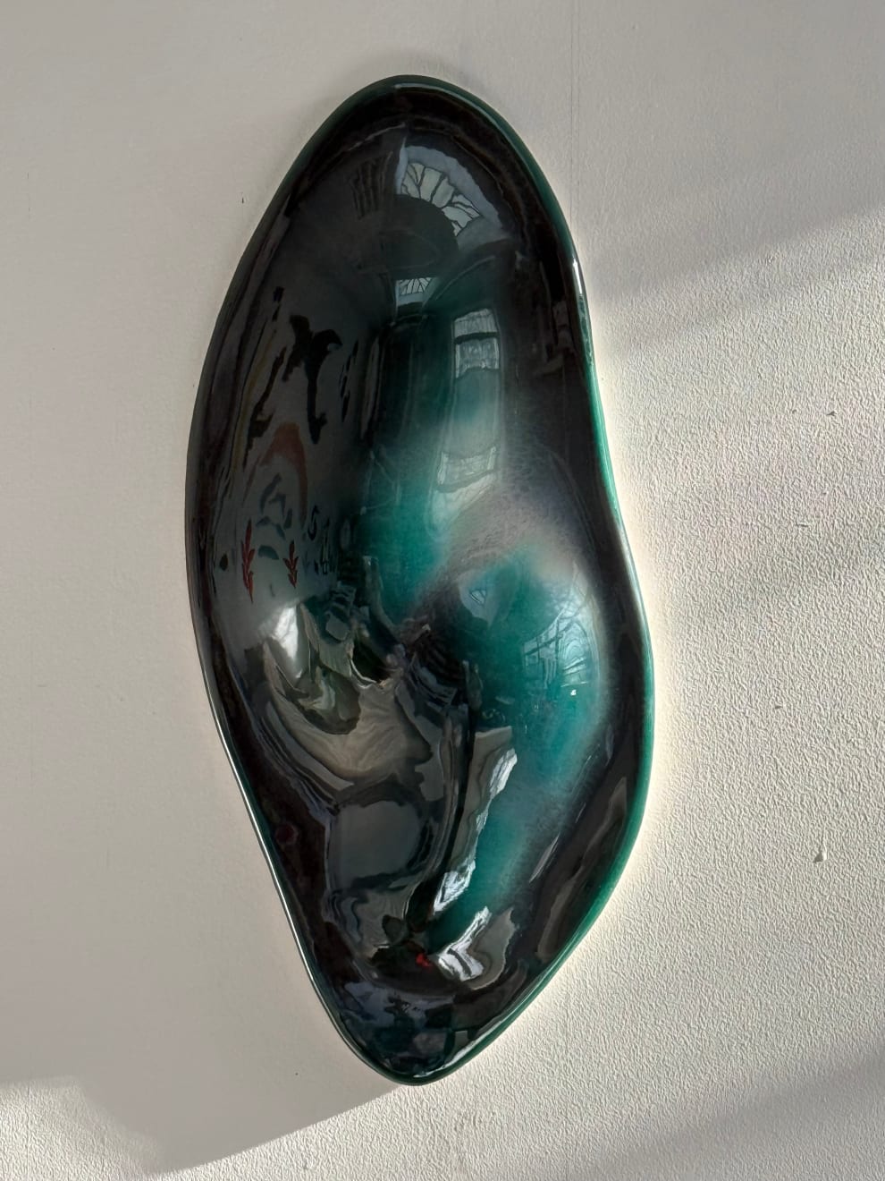Glazed ceramic blue green sculpture by Fringe Gallery artist Angela Okajima-Kempinas