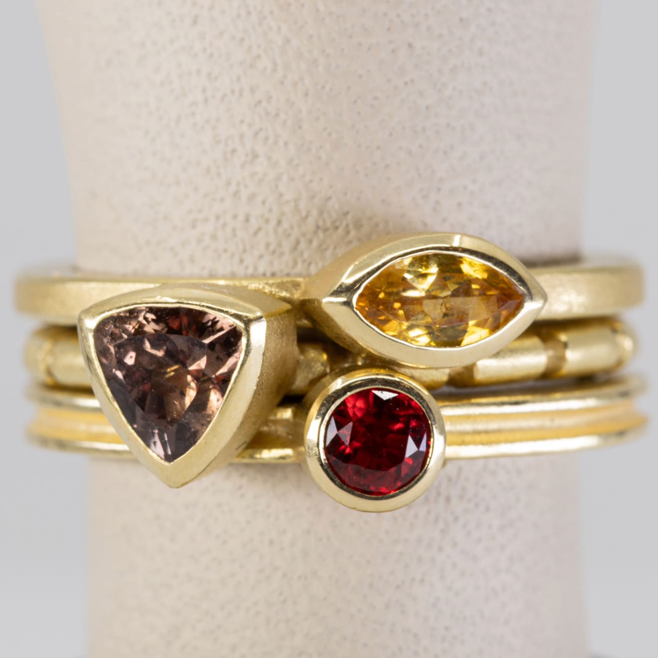 Barbara Heinrich, Rust Color Trillion Sapphire Ring with Bamboo Band