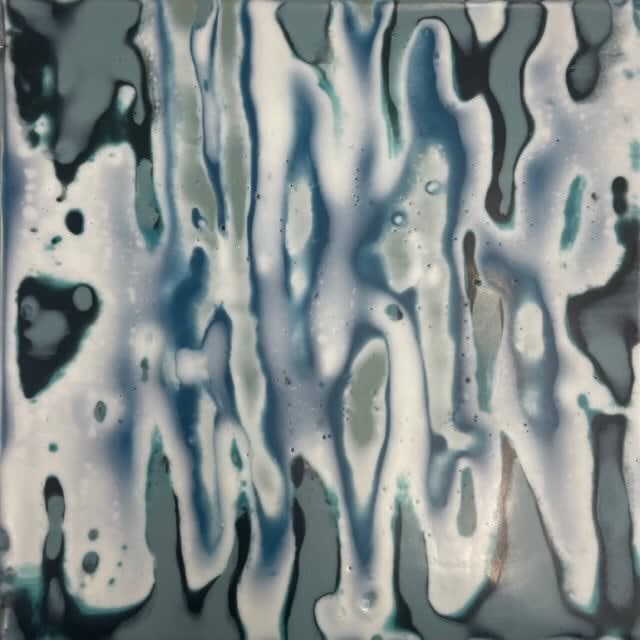 Gray and blue Encaustic painting resembling tie-dye by slate gray gallery artist Shawna Moore