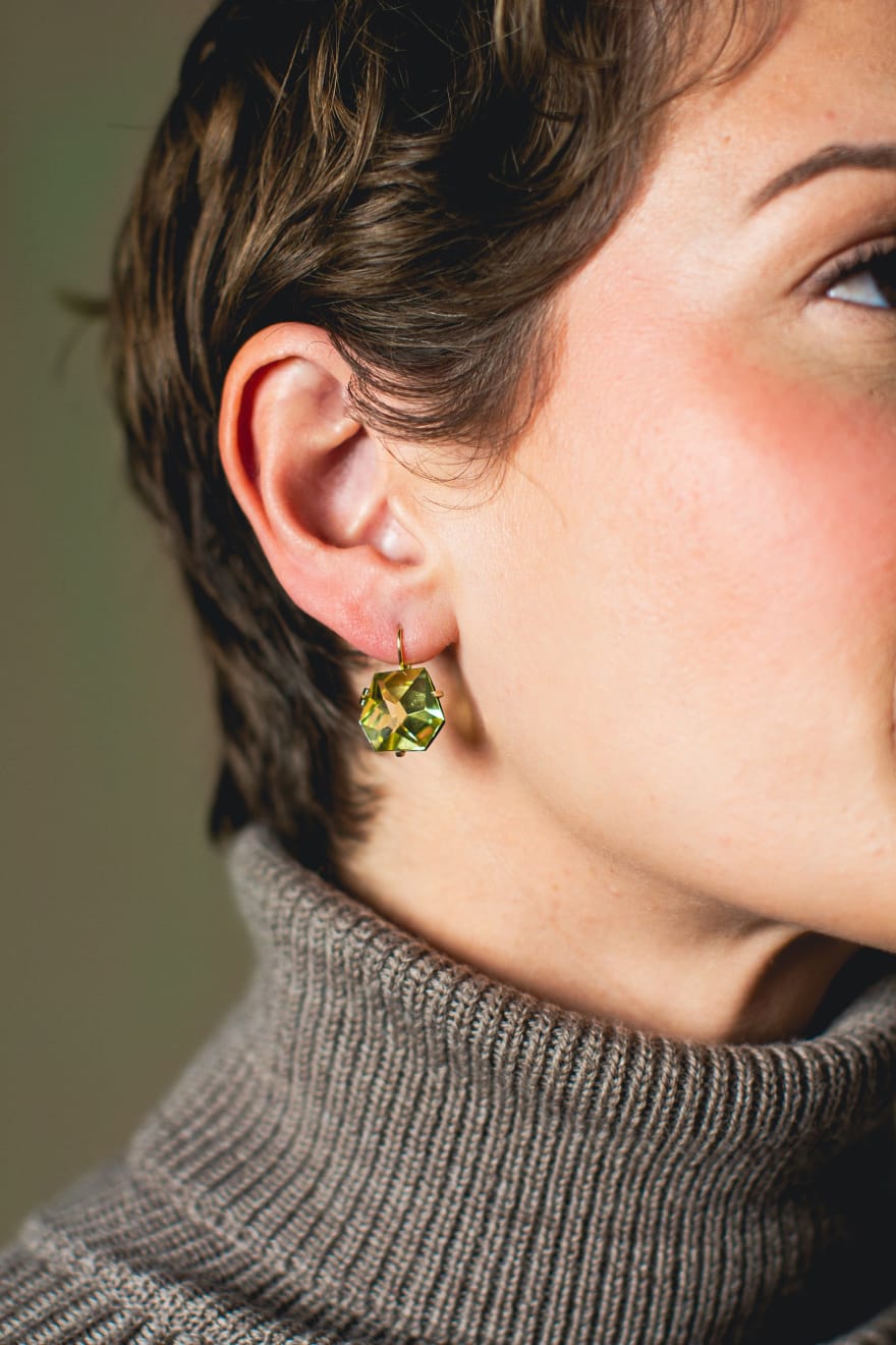 Hand cut faceted chunks of Lemon Citrine prong set in 18k prongs and hanging from 18k ear wires by Fringe Gallery studio jeweler Elizabeth Garvin