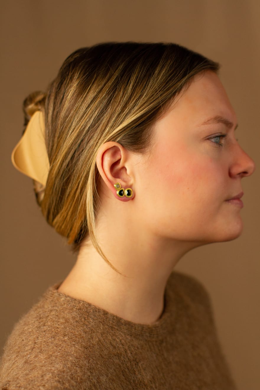 22k and 18k yellow gold earrings with black and gray diamonds by Fringe Gallery studio jeweler Petra Class.