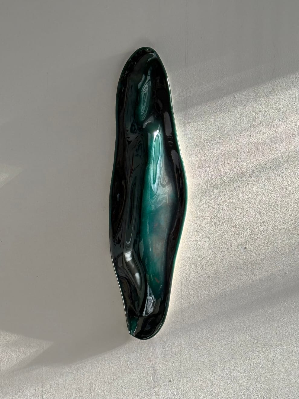 Glazed ceramic blue green sculpture by Fringe Gallery artist Angela Okajima-Kempinas