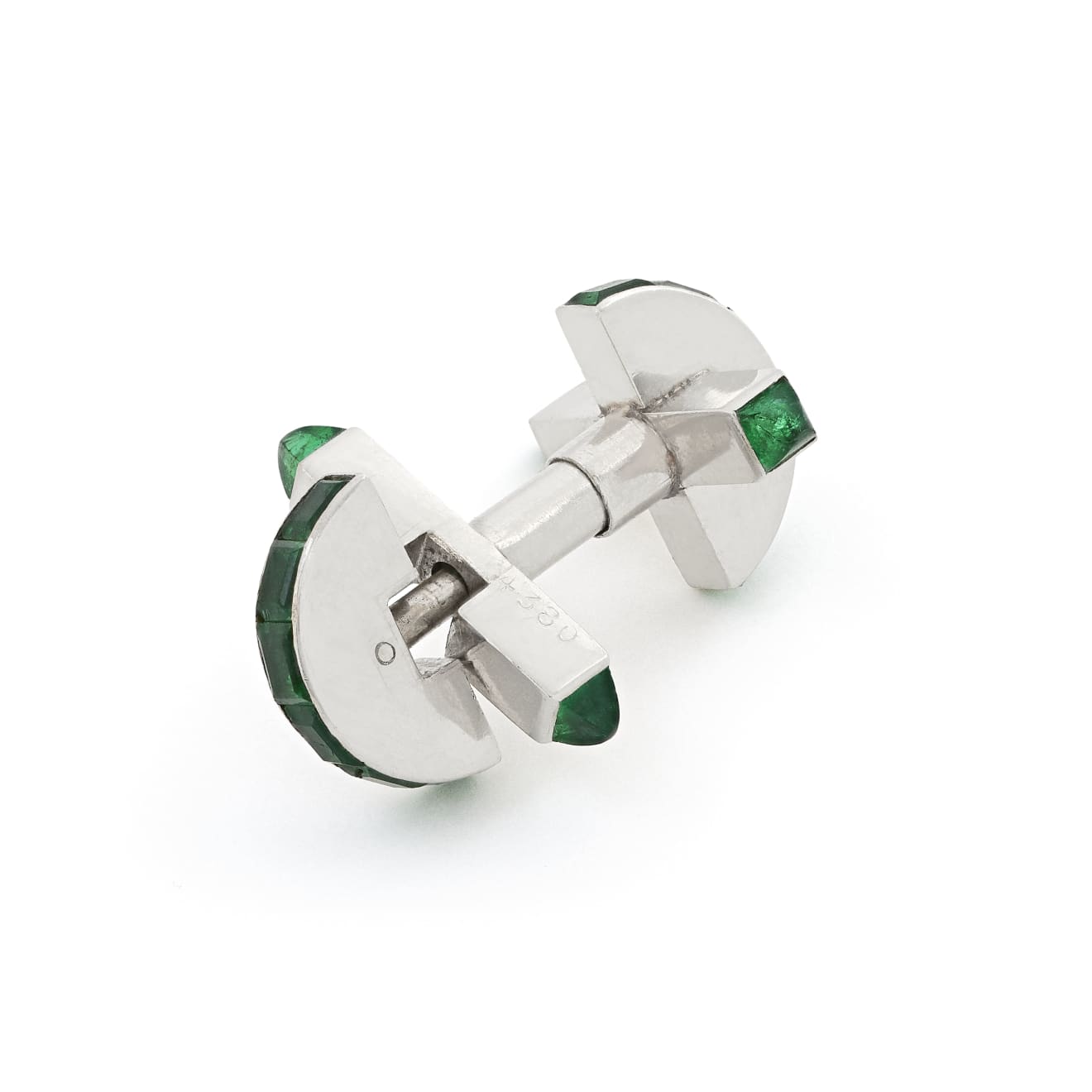 CARTIER A pair of platinum and emerald cufflinks 1937 Symbolic