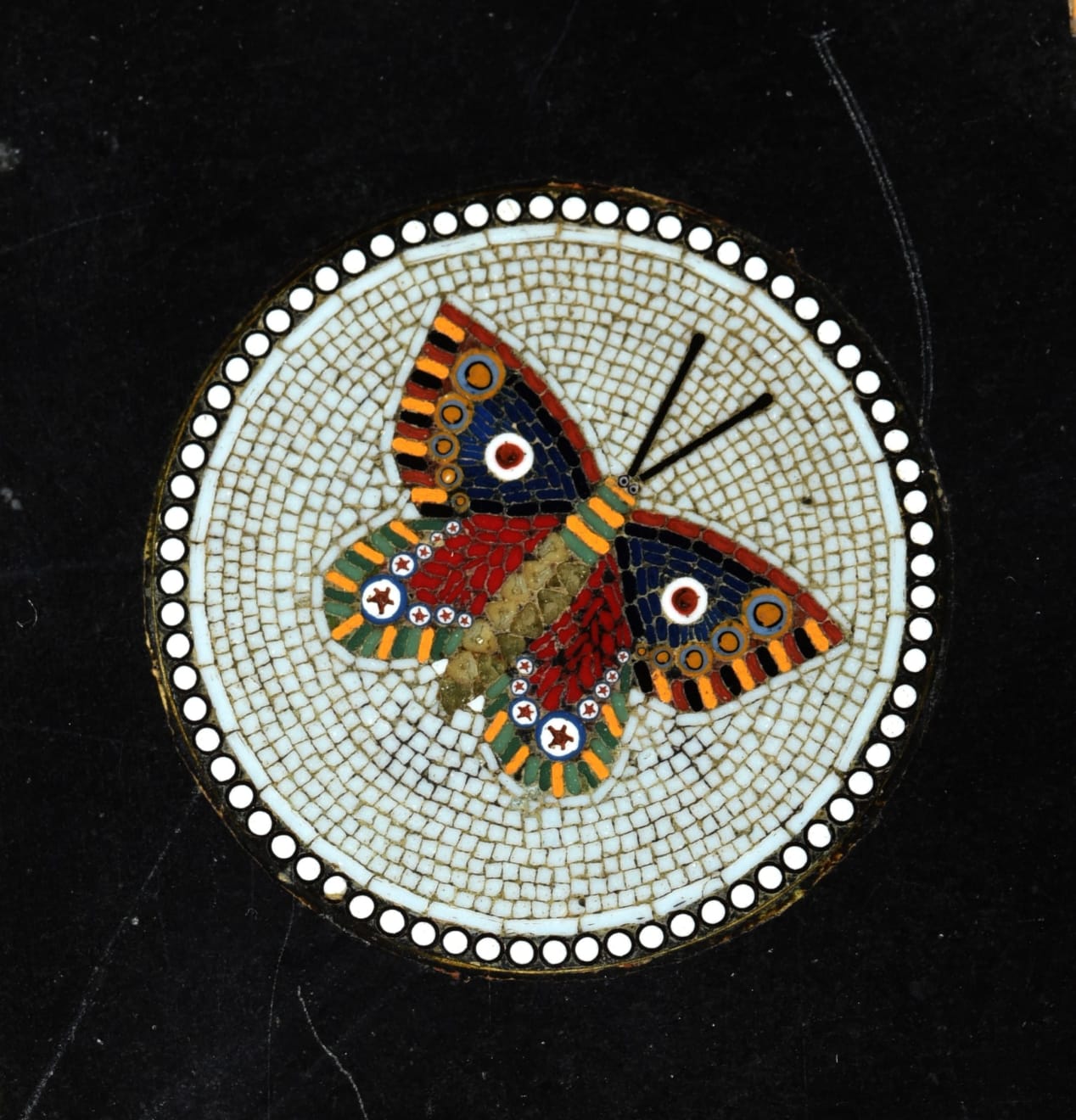 Attributed to Andrea Volpini (Rome doc. 1756-1812) and Giacomo Raffaelli (Rome 1753-1836), SOLD TO THE MUSEUM OF FINE ARTS, HOUSTON - Marble Panel centred with a Mosaic Depicting a Bacchante and surrounded by micromosaic medallions of Butterflies