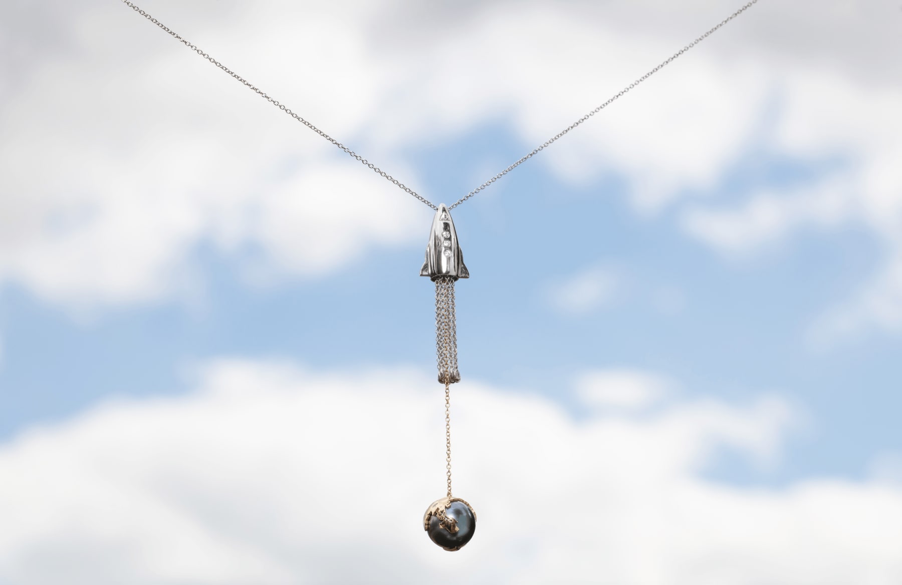 Maya, Cosmic: Rocket pendant