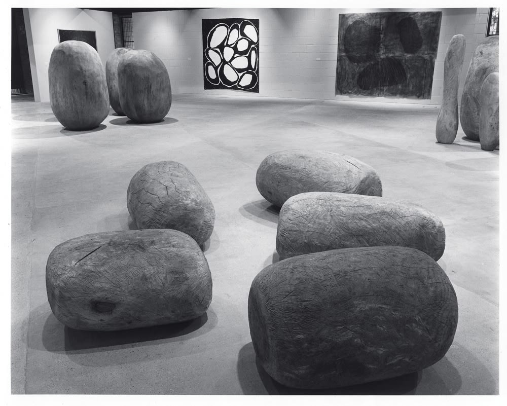 Nicholas Pope, Installation view with Five Elm Lumps (1981), Big Balls (1981), Many Black Holes (1981) and Three Black Lumps (1979), John Hansard Gallery, University of Southampton, Southampton, 1982