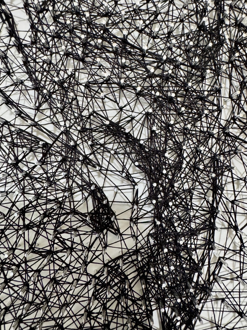Prabin Badhia, Strike a Pose / Bare Lady - 9580 iron nails & 625 meters cotton string, 2025