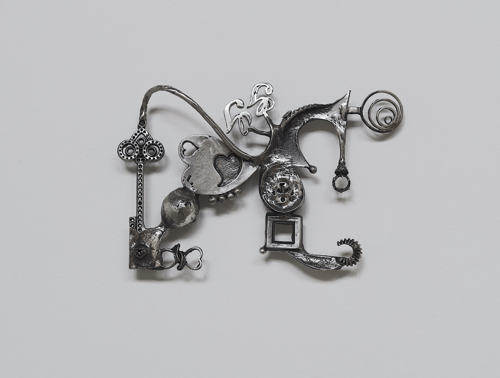 ASMA Oración M, 2024 Sterling silver 8 x 12.5 x 1.5 cm (3.15 x 4.92 x 0.59 in) (ASM-2024-10)