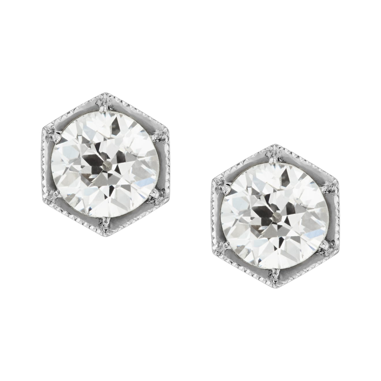 Aril Jewels honeycomb diamond stud earrings from clara collection with old-cut diamonds in platinum hexagon settings with millegrain detail. On white backrgound