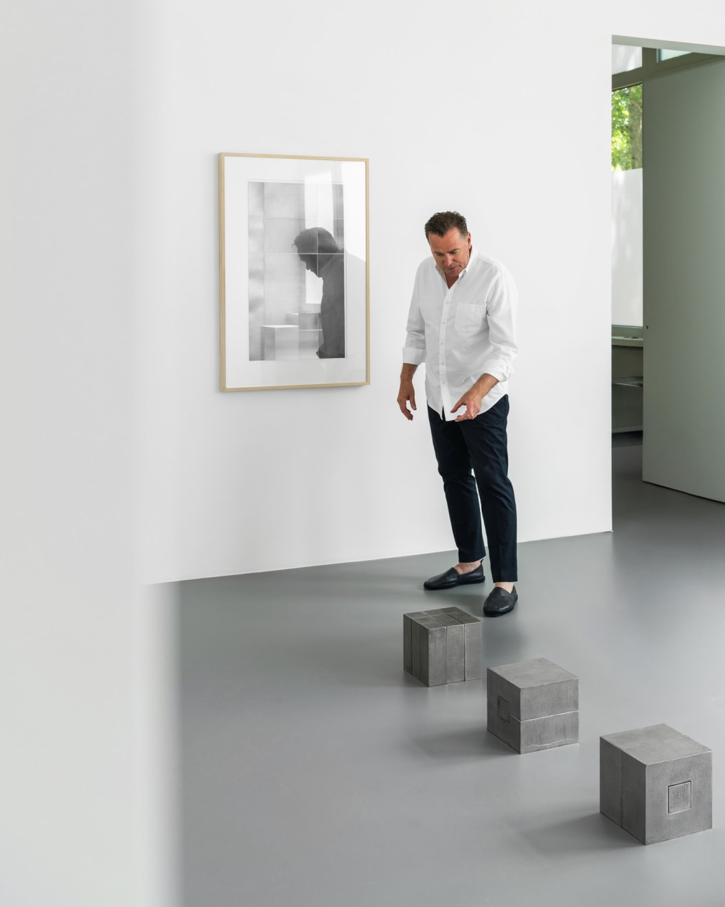 The iron sculptures form a silent unity within the space. Carefully staged in the room, they speak a universal language...