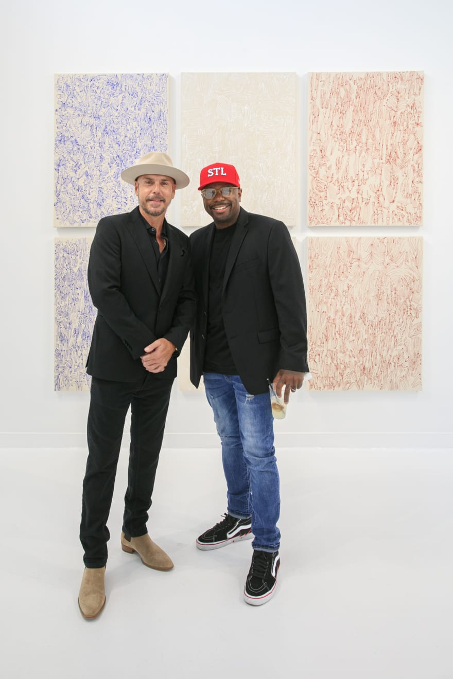 Guests at the opening reception of "Tiger Moth", a solo exhibition by Sarah Giannobile. Photo by Suzy Gorman