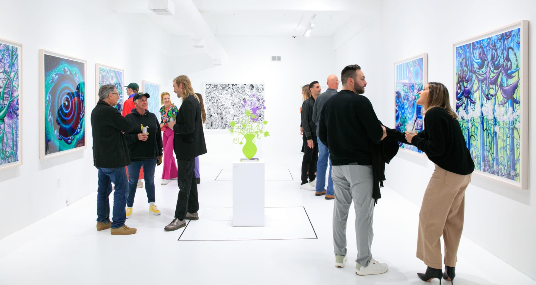 Guests at the opening reception for Dan Alva's "Something Out of Nothing" & Kenny Scharf's "Woodz 'N Thingz" presentation
