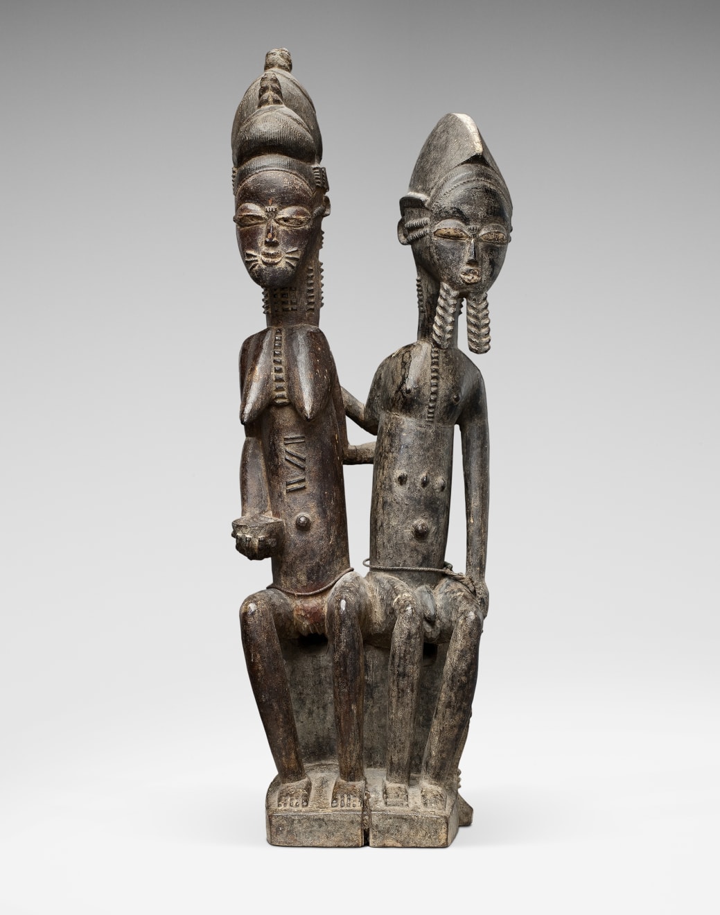 Seated Baule couple, Ivory Coast