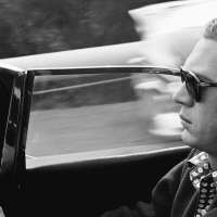 Steve McQueen driving through Nicolas Canyon