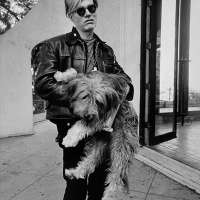 Andy with dog at John Phillip Law's house, Los Angeles