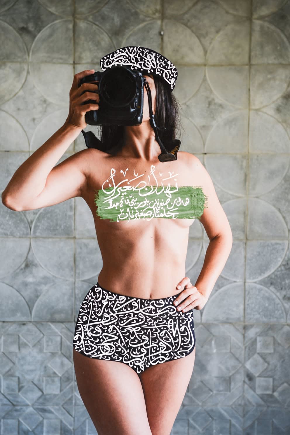 Ammar Abd Rabbo, The Photographer (Two small breasts with small areolas light brown color and small nipples), 2015