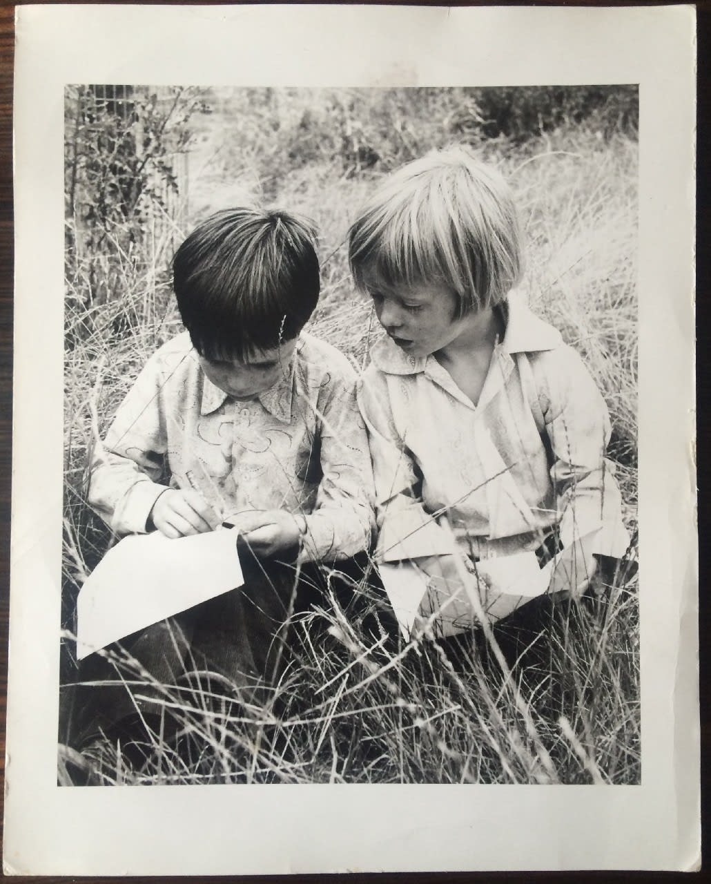Jo Spence, Gypsies (two children writing), 1974
