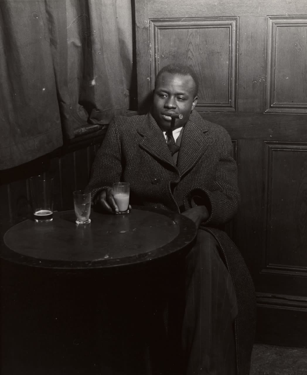 Bill Brandt, At the Pub (Man with Cigar, Soho, 1942), 1942