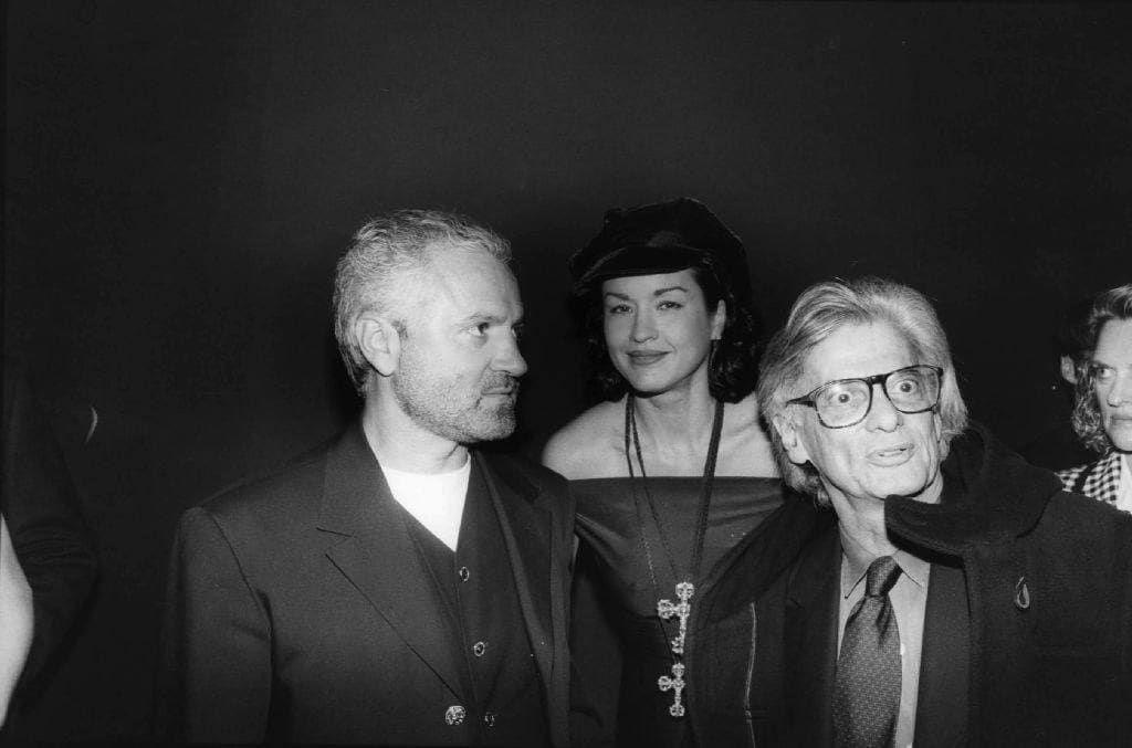 Bill Cunningham, Gianni Versace and Richard Avedon attending "Gianni Versace: Signatures" at FIT Museum, November 5, 1992