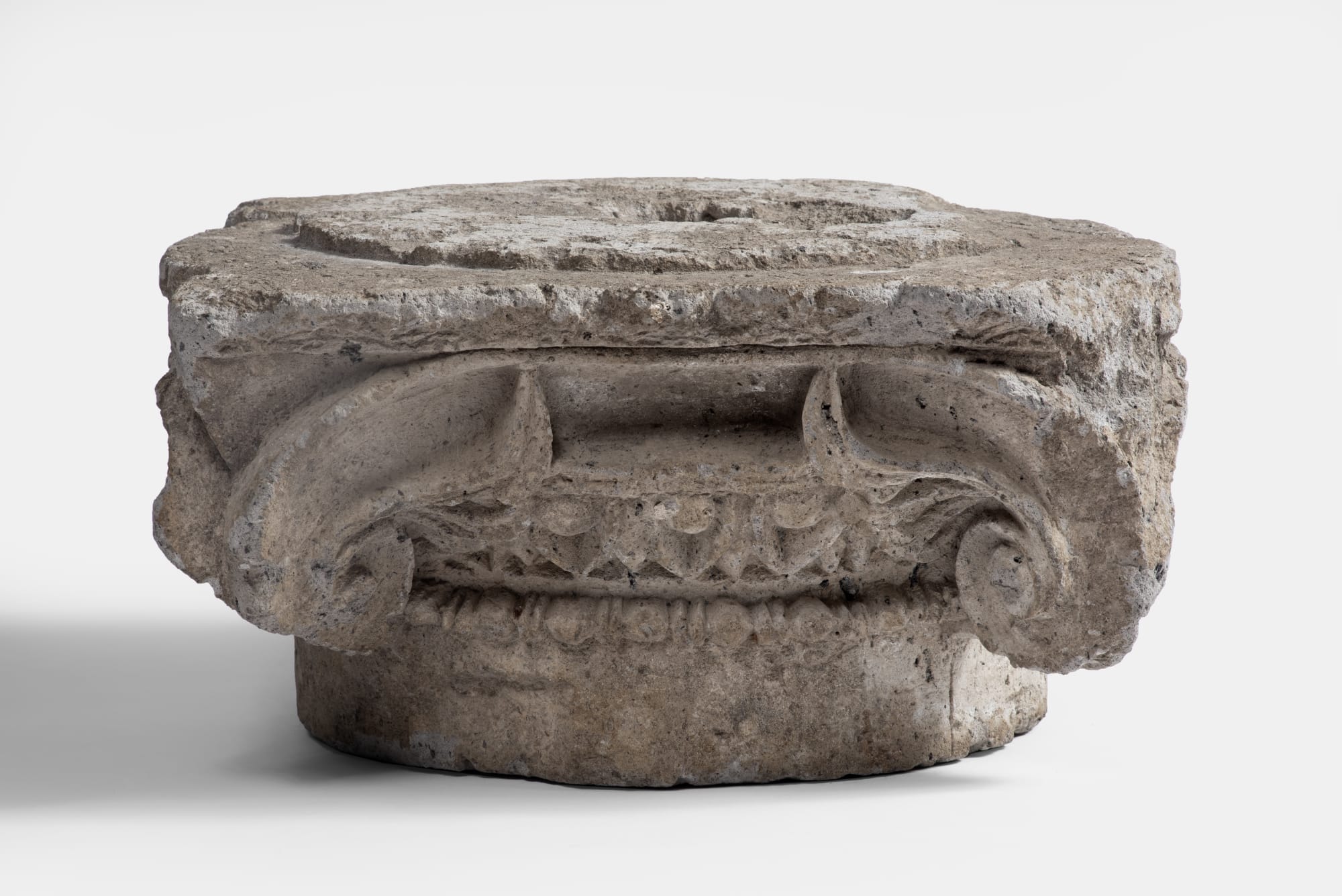 LATE HELLENISTIC TRAVERTINE IONIC CAPITAL, Greece, 1st/2nd Century A.D.