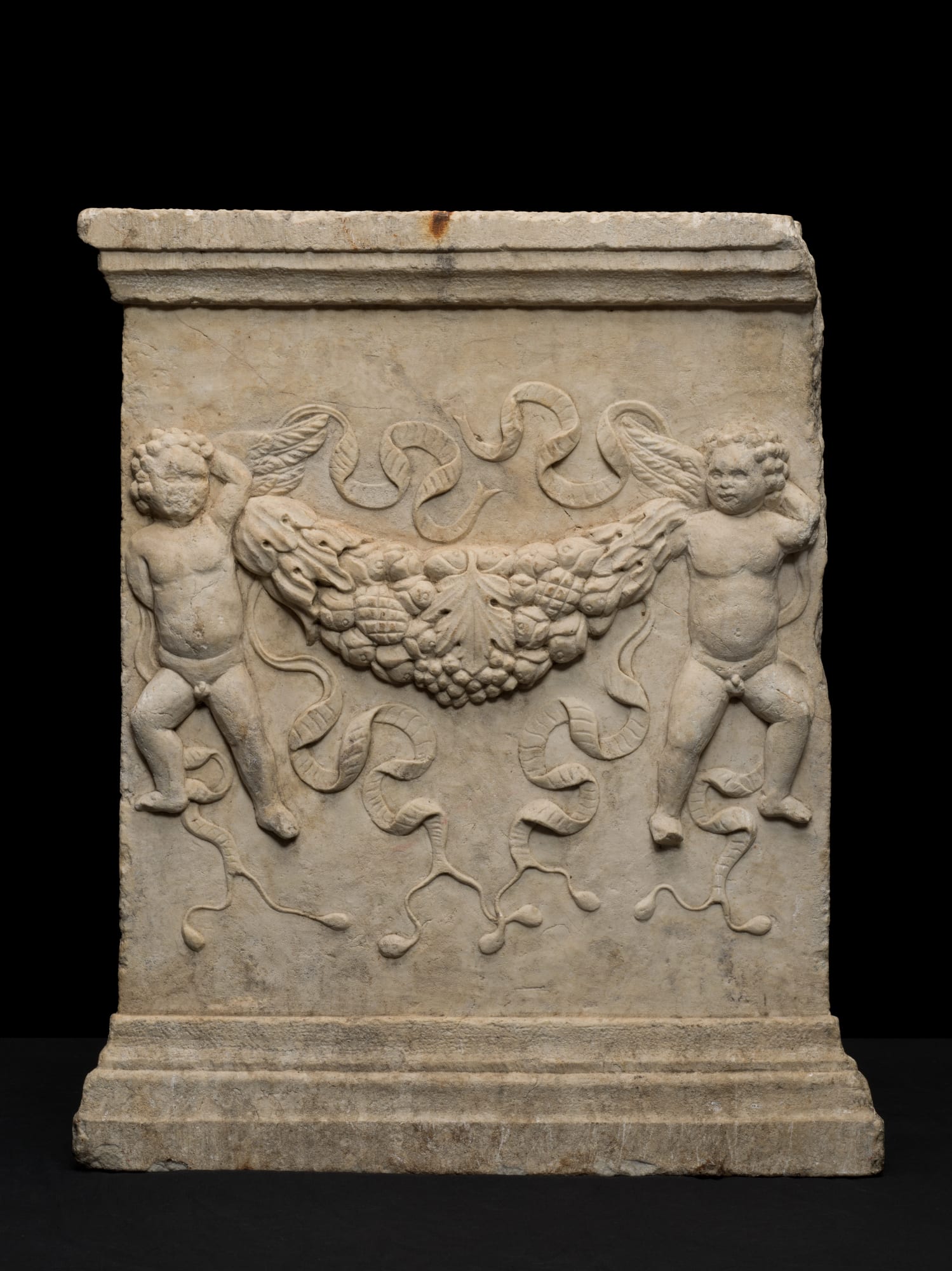 Relief with putti holding garlands, 16th Century (TBC)