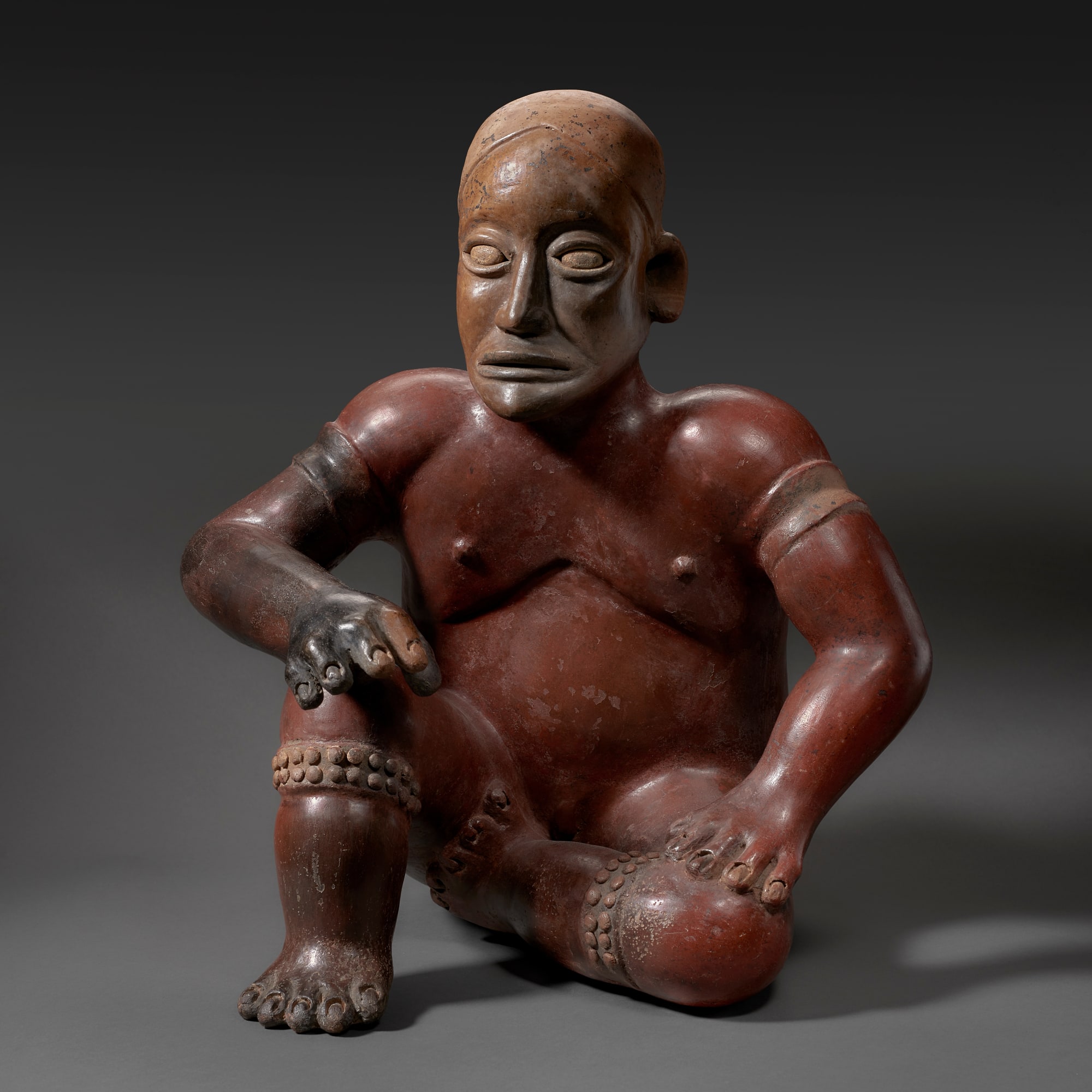 7. Seated Figure of a Wrestler Jalisco, Protoclassic Period, ca. 100 B.C. - A.D. 250