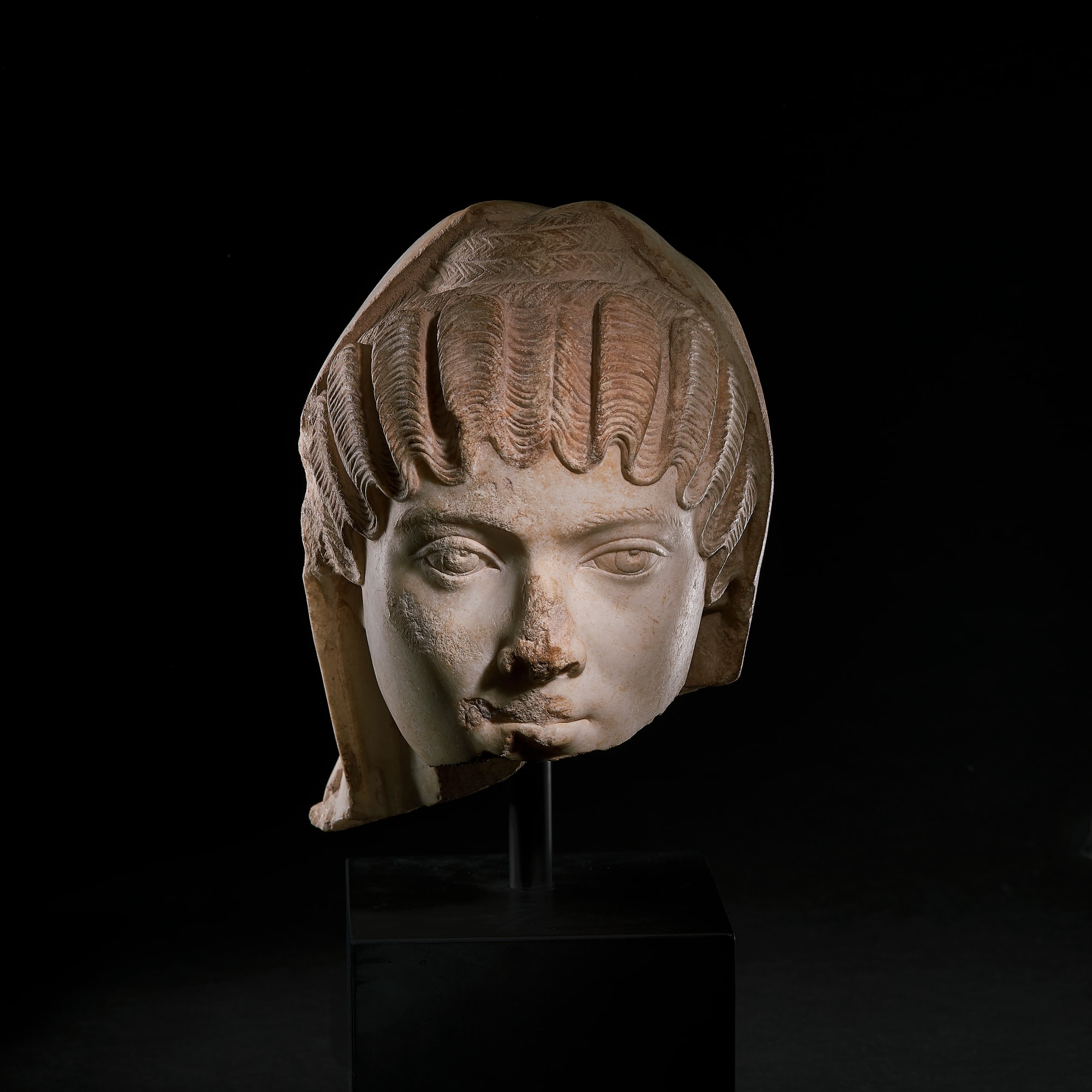 12. Portrait Head of a Veiled Woman Roman, Imperial Period, ca. 150-200 A.D.