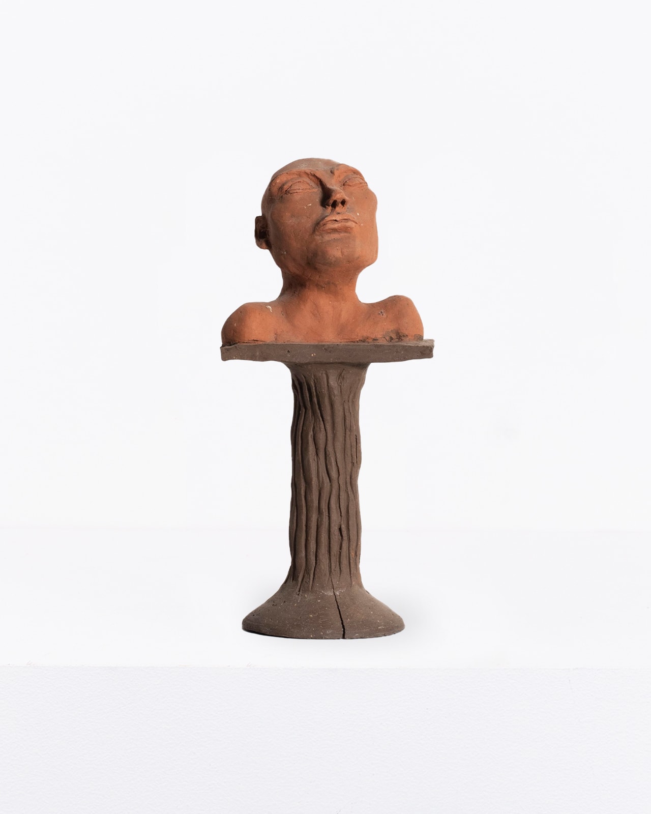 Prue Piper, Small male head on pedestal