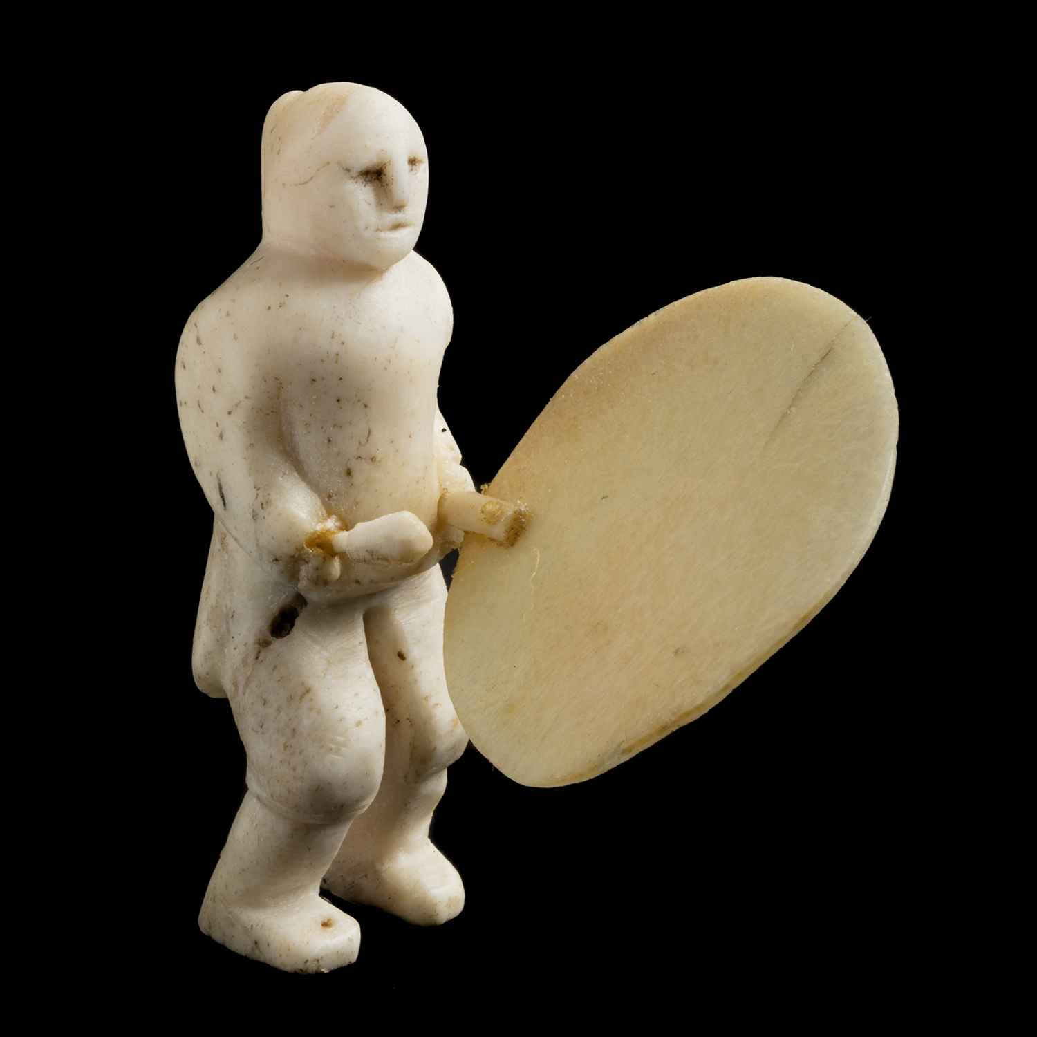 UNIDENTIFIED ARTIST, POSSIBLY ARCTIC BAY Drum Dancer, 1973 bone and ivory, 2.75 x 1.5 x 2.5 in (7 x 3.8 x 6.3 cm) unsigned.