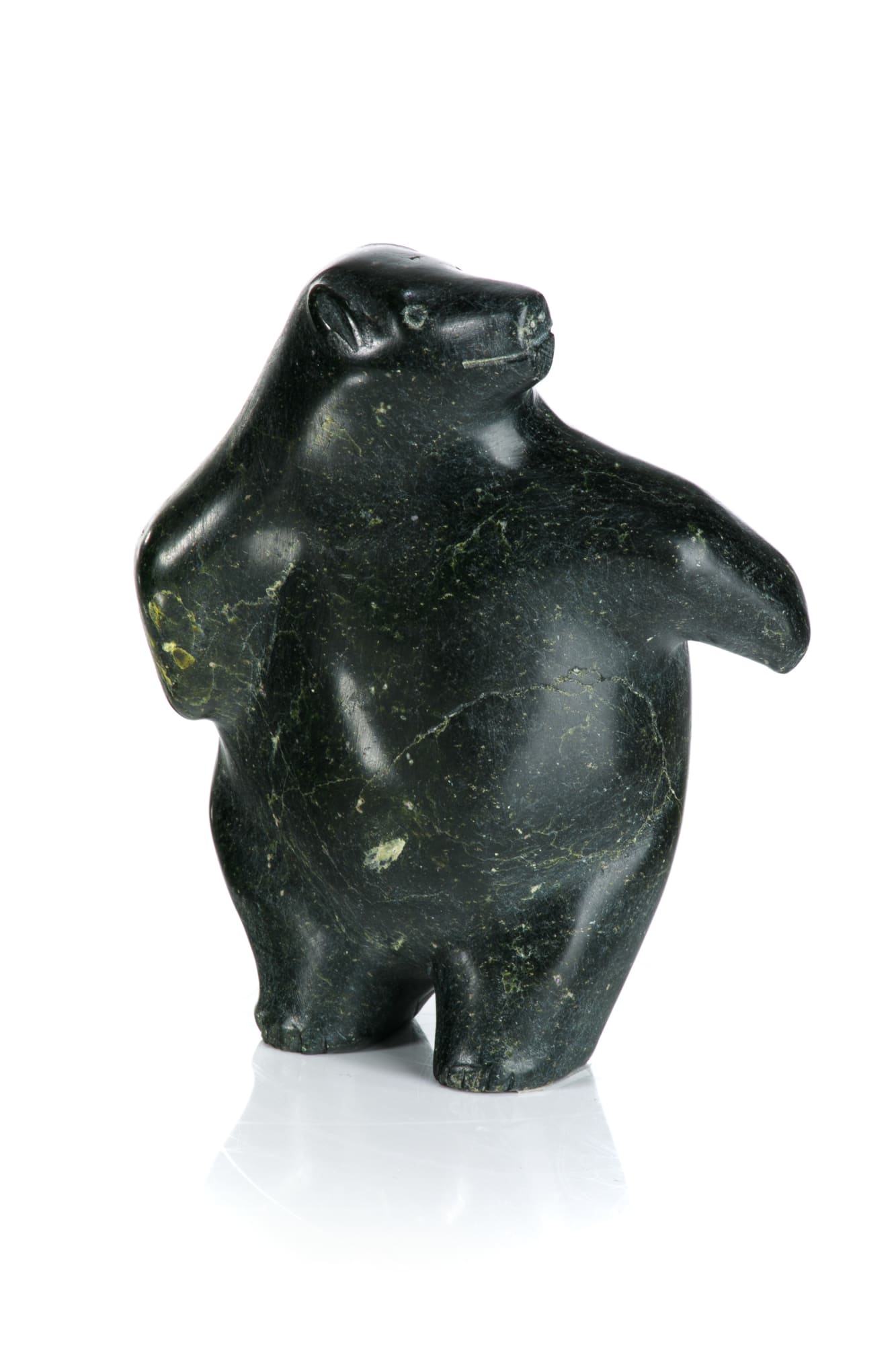 PAULOOSIE KARPIK (1911-1988) PANNIRTUQ (PANGNIRTUNG) Dancing Polar Bear, early 1970s stone, 5.5 x 4.25 x 2.5 in (14 x 10.8 x 6.3 cm) $500