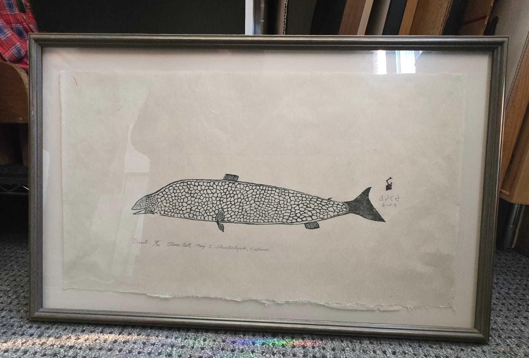 27 LUKE IKSIKTAARYUK (1909-1977) QAMANI’TUAQ (BAKER LAKE) Trout, 1969 (1970 #33) stonecut, 14.25 x 22.75 in (36.2 x 57.8 cm), framed