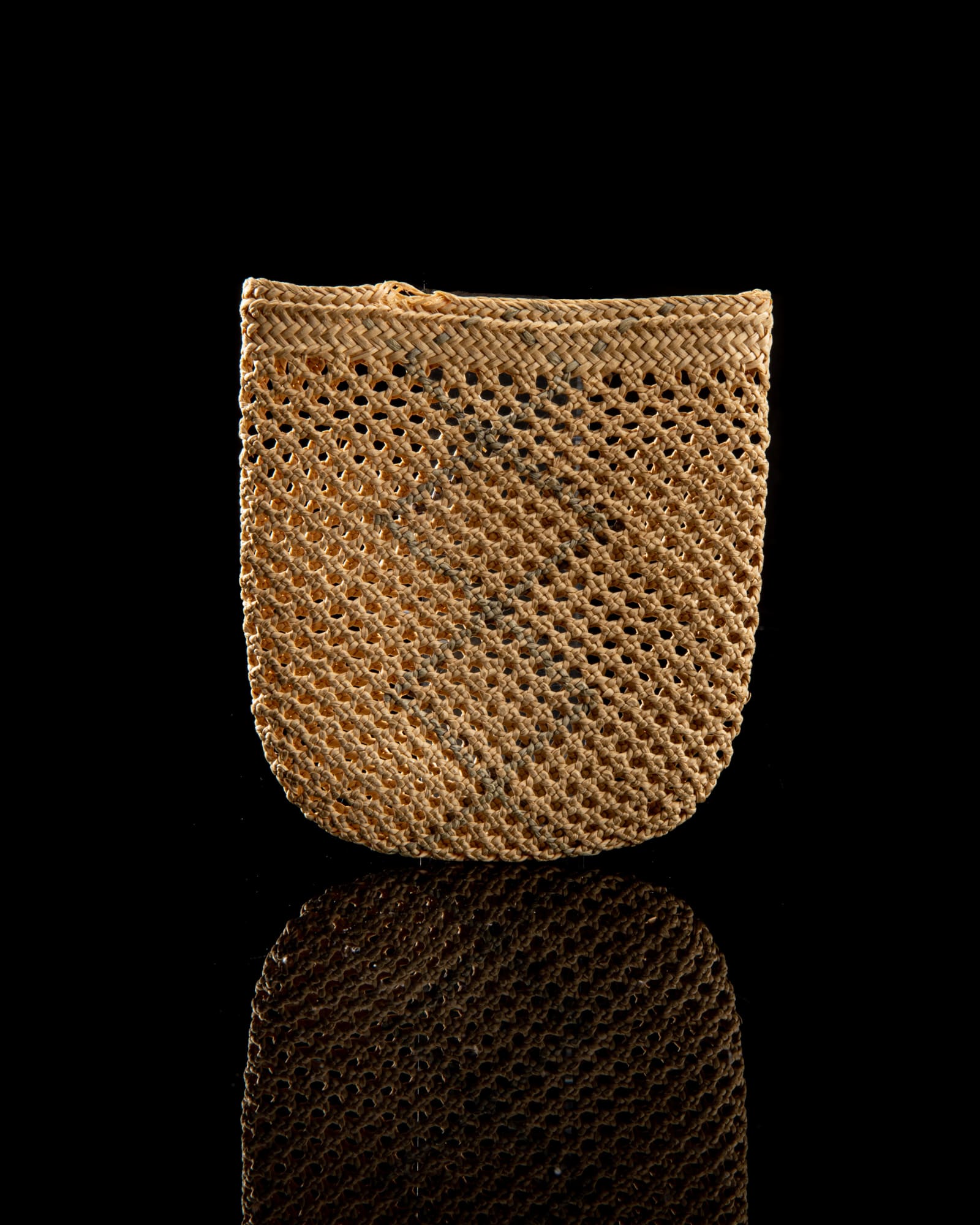 UNIDENTIFIED MAKER, ATTU Open Weave Pouch, late 19th century wove root, dyed and grass, 3 x 3 x .25 (7.6 x 7.6 x 0.6 cm) $450