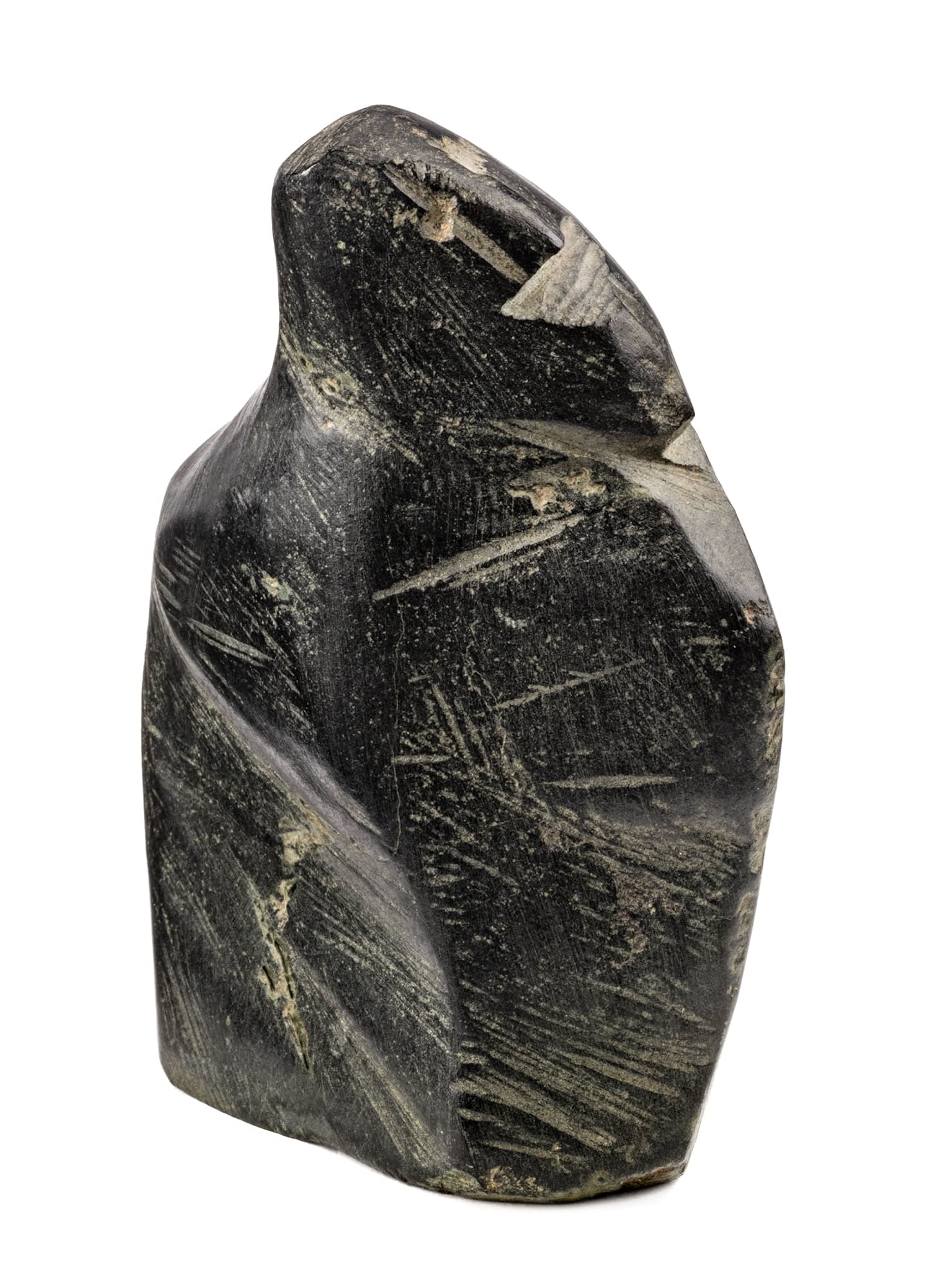JOHN KAVIK (1897-1993) KANGIQLINIQ (RANKIN INLET) Figure, c. 1980 stone, 4 x 1.5 x 3.25 in (10.2 x 3.8 x 8.3 cm) $2,200