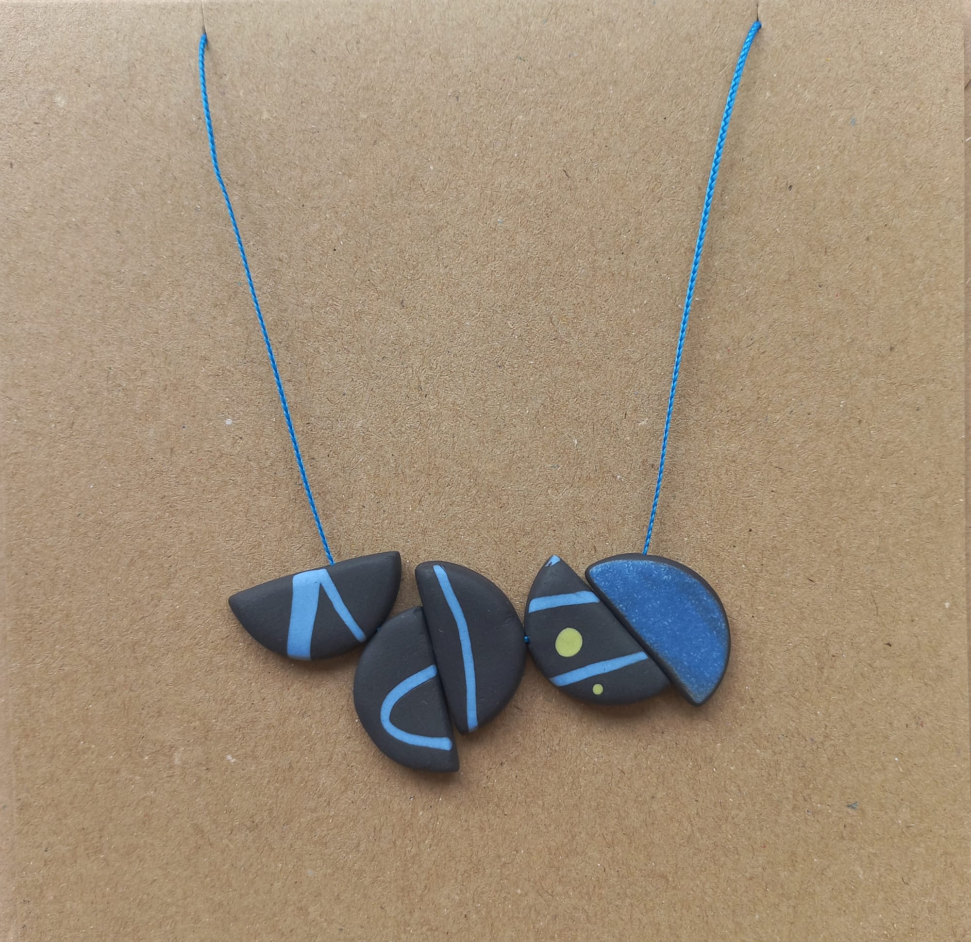 Carol Sinclair, Semi Circle Necklace III