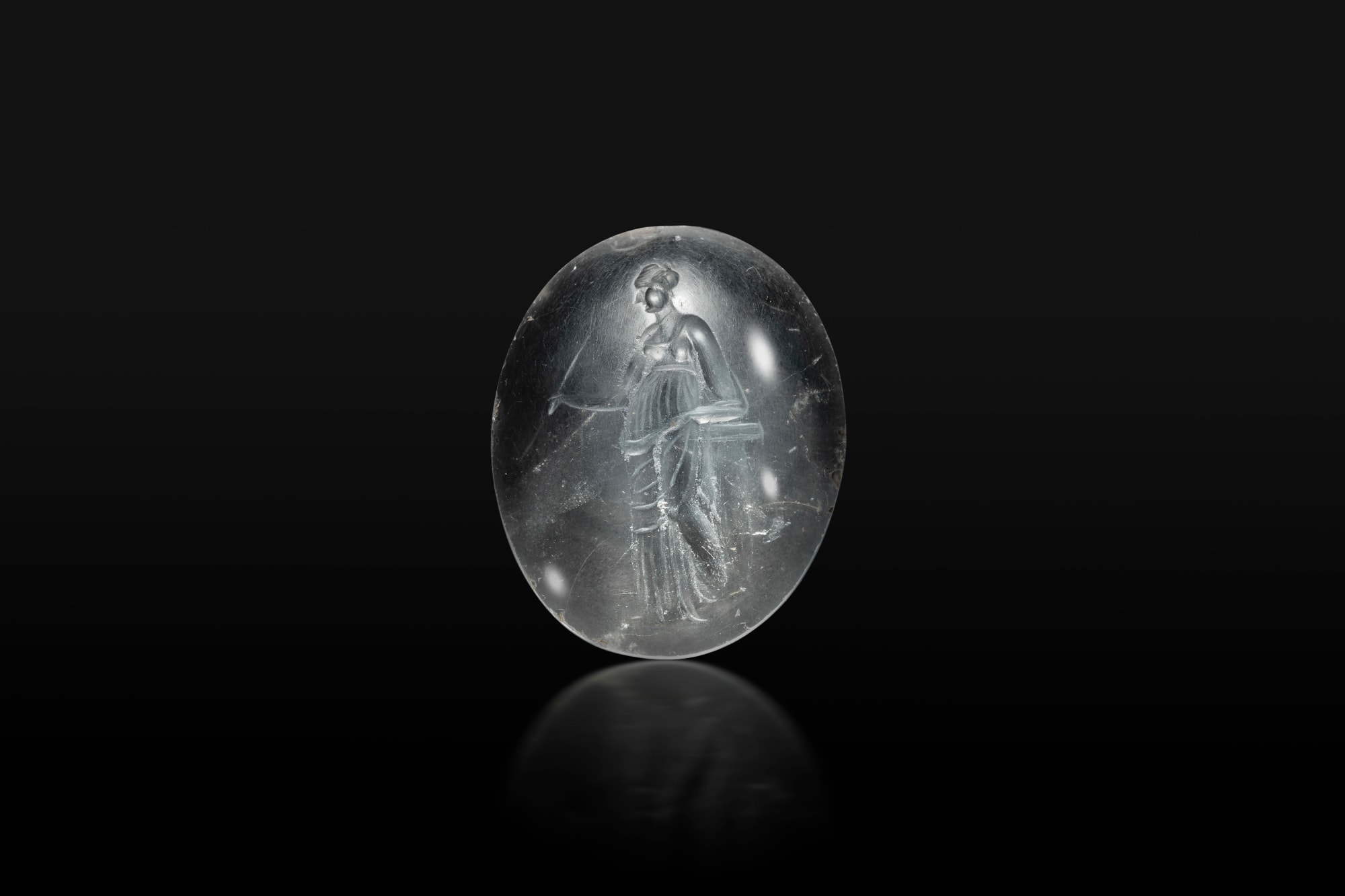 Greek, A Greek rock crystal intaglio of a woman, Hellenistic, circa late 3rd - 2nd century BC