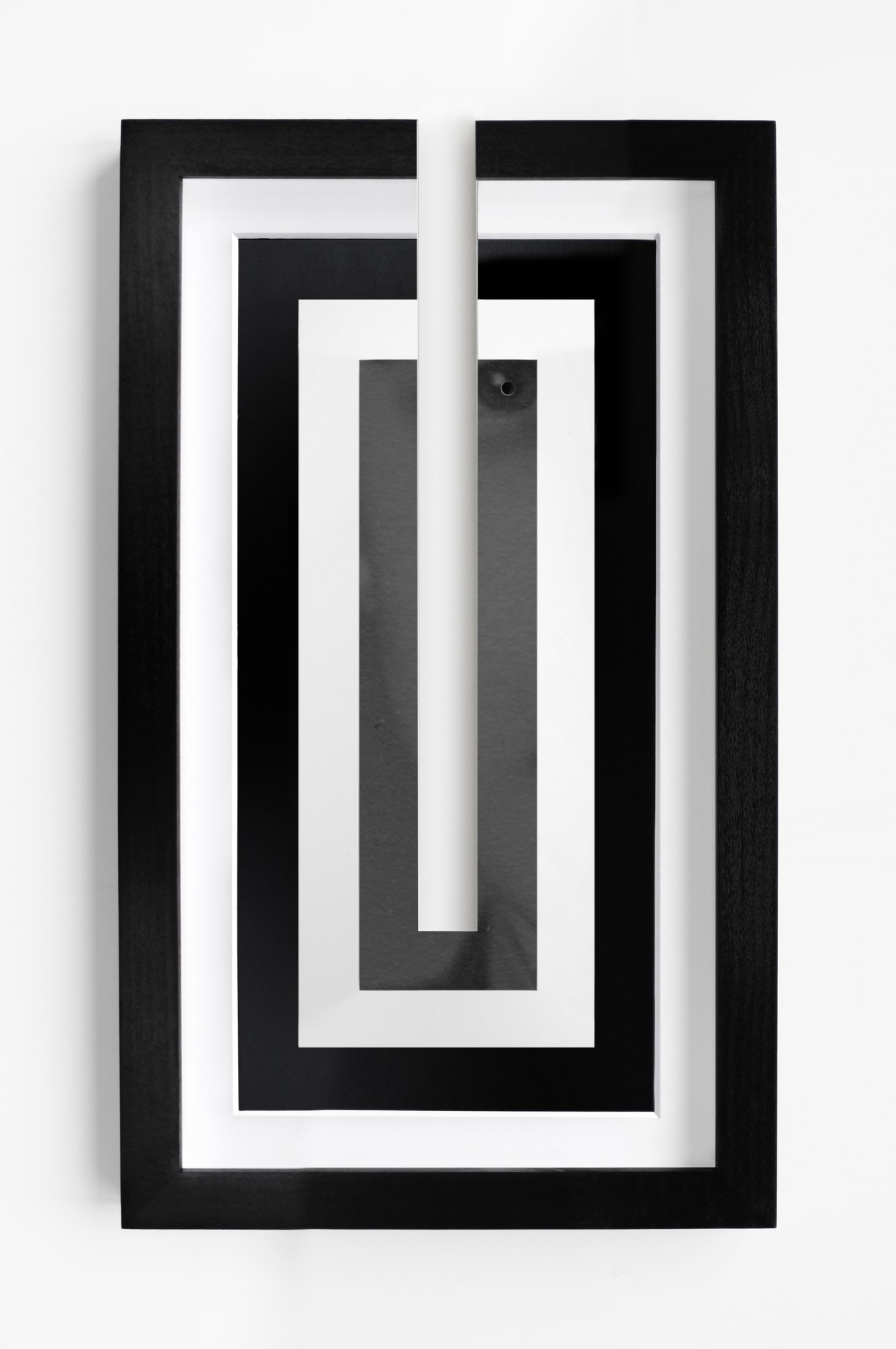 Jonny Briggs, Blink 1 (cut photograph, rephotographed with my eye staring through), 2022